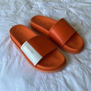 New Calvin Klein orange slides